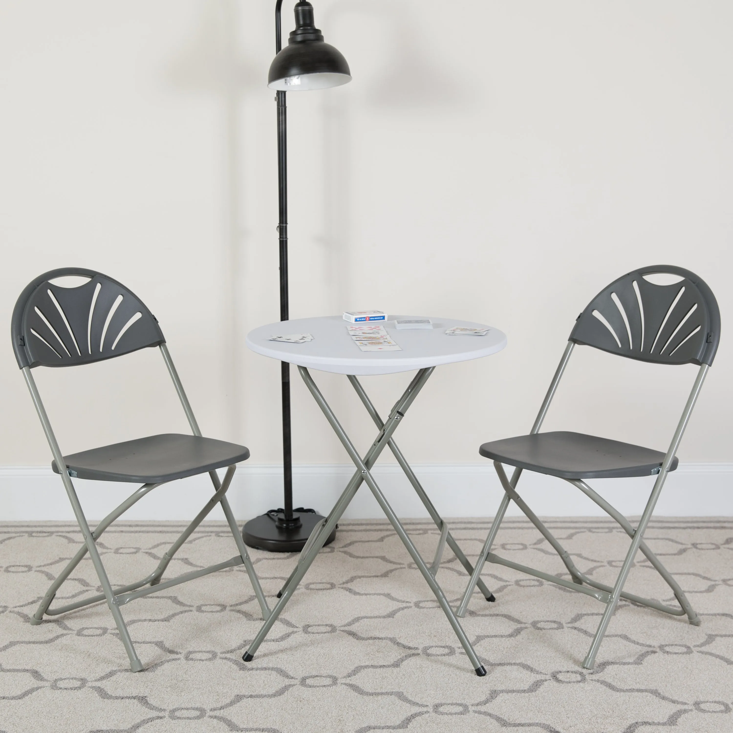 2 Pack HERCULES Series 650 lb. Capacity Charcoal Plastic Fan Back Folding Chair